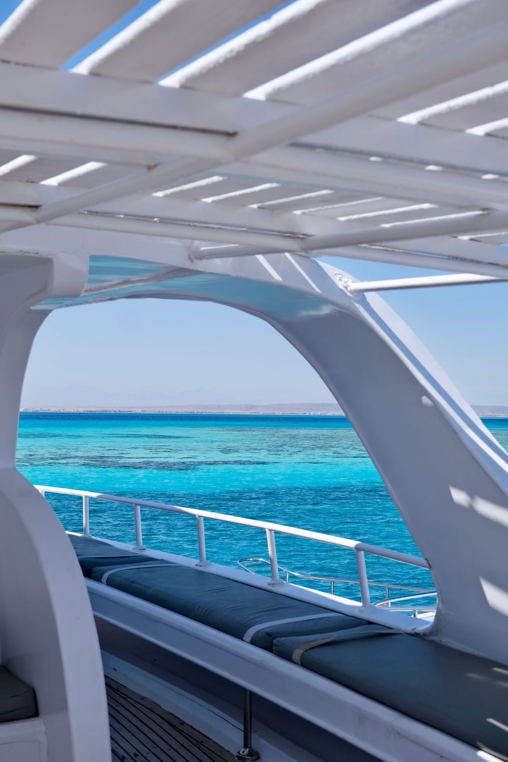 Boat deck with a view of the turquoise Sataya lagoon